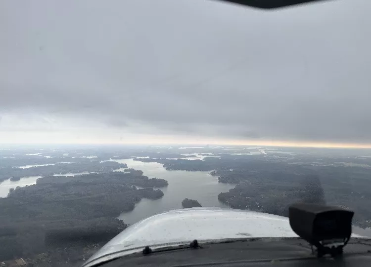 clouds are coming over Lake Norman snow