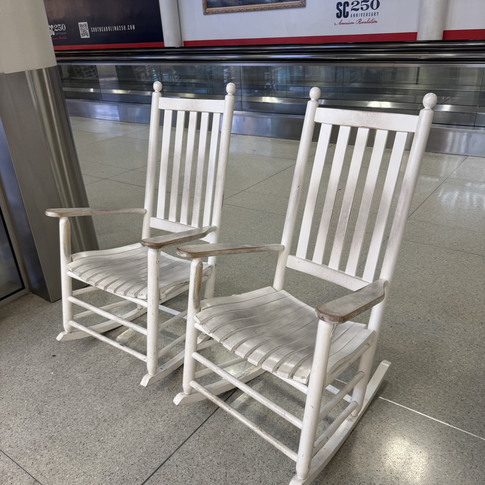 At Charlotte International, the rush of the world collides with the stillness of the rocking chair. Every chair is a momentary sanctuary, a simple wooden perch where multi-million dollar deals are paused, futures are plotted, and farewells are lingered over. But for the aspiring pilot, these chairs hold something far more precious than rest. They hold the final, quiet commitment before the journey begins. They cradle the dream of the first solo, the imagined feel of the yoke, the silent ambition to trade the terminal floor for the flight deck. They're where future captains close their eyes and rehearse the call to the tower, where the life-changing decision to learn to fly with Race City Flight Operations is solidified between destinations. These chairs are a testament to patience, reflection, and impending action. They are the grounding point before the great ungrounding. Don't just sit and wait for your flight. Sit and plan your ascent.