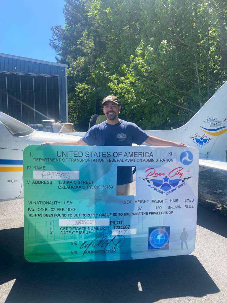 Briggs is the newest Commerical pilot!